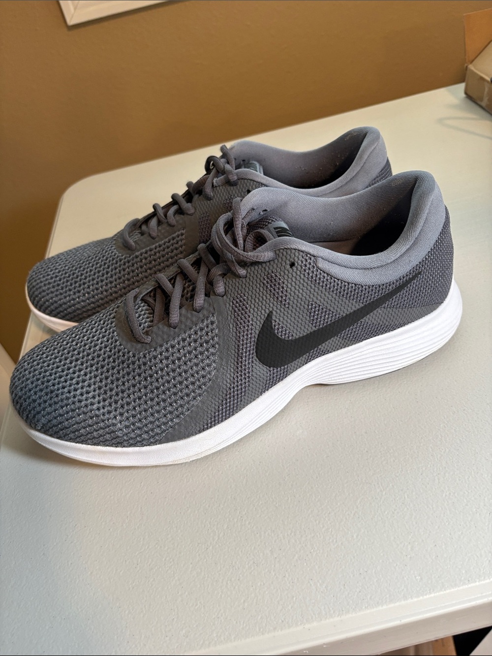 Nike Men’s Athletic Shoes - Dark Gray with White Sole
Size: 11.5